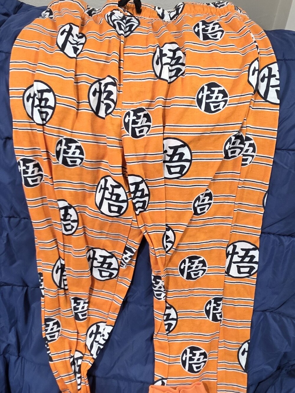 Dragonballz Orange Graphic Lounge Pants with Black & White Emblems